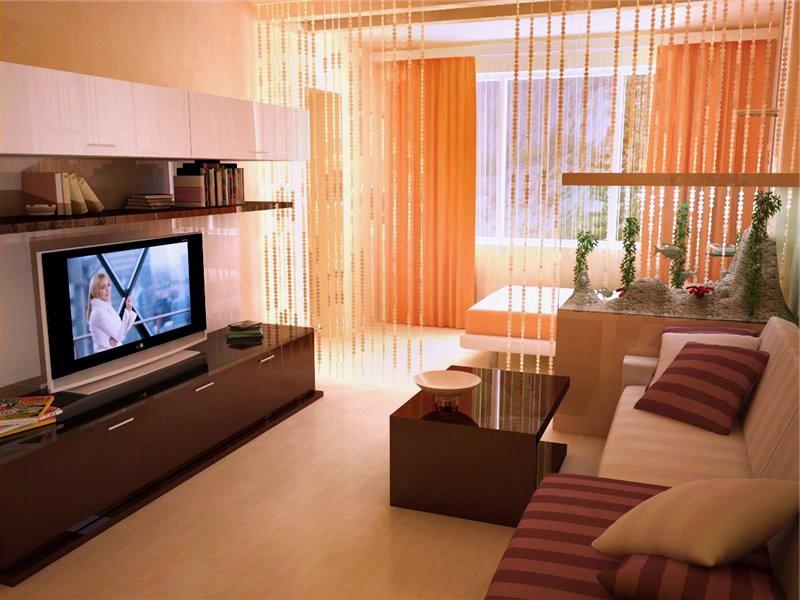 Разделение гостиной на зоны можно провести с помощью стеллажей, ширм и даже дивана