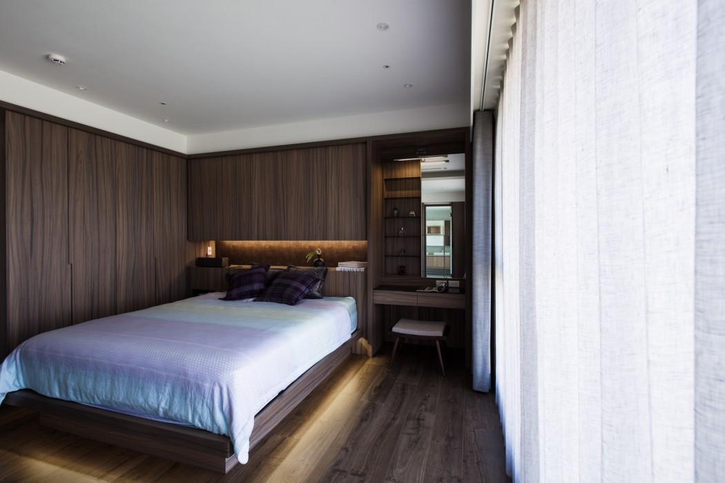 Если вы предпочитаете натуральные материалы, тогда можно оформить спальню, используя деревянную отделку